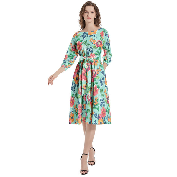 Embrace timeless elegance with our Flora Print Boat Neck Dress.
