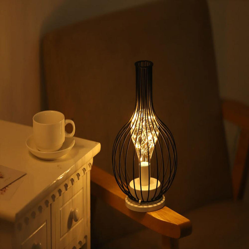 Create a cozy atmosphere with our feathered night lamp. 